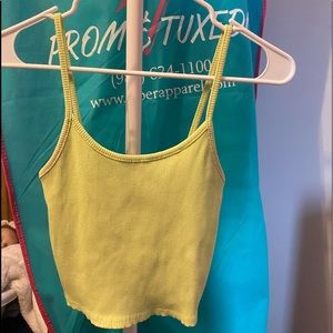 I’m selling this AE tank top the color is lime green and it’s a size S.